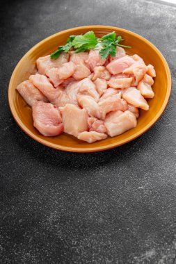 Tavuk, çiğ et, kümes hayvanları lezzetli lezzetli lezzetli gurme yemek arkaplanı, masa rustik gıdalar, fotokopi alanı ve paleo diyeti.