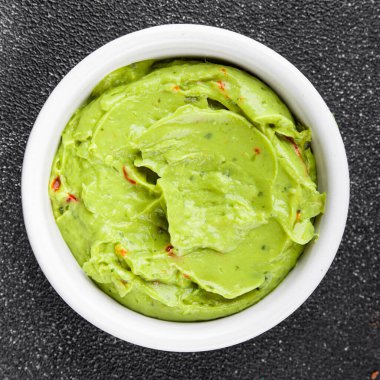 Guacamole sosu avokado sosu soğuk meze organik ürün lezzetli gurme yemek arkaplan masa üzerinde rustik gıda üst görünüm fotokopi alanı keto ve paleo diyet vejetaryen ve vejetaryen gıda