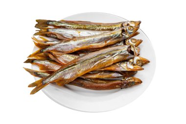 Tütsülenmiş balık capelin tabağı taze gurme yemek arka planda masa rustik gıda üst görünüm fotokopi alanı pesseeter diyet