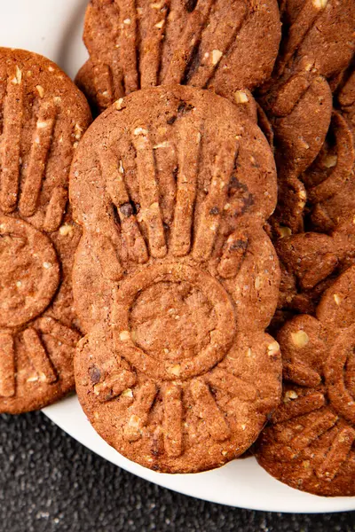 Kurabiye, çikolata, mısır gevreği, tatlı tatlı organik lezzetli gurme yemek arka planı, masa kırsal yiyeceklerin üst görünümü, fotokopi alanı.