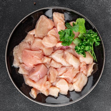 Tavuk, çiğ et, kümes hayvanları lezzetli lezzetli lezzetli gurme yemek arkaplanı, masa rustik gıdalar, fotokopi alanı ve paleo diyeti.