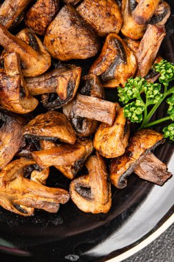 Mantar kızartması şampiyonu sebze yemeği taze gurme yemek masanın üzerinde rustik yemek üst görünüm fotokopi alanı vejetaryen ve vejetaryen yemekleri