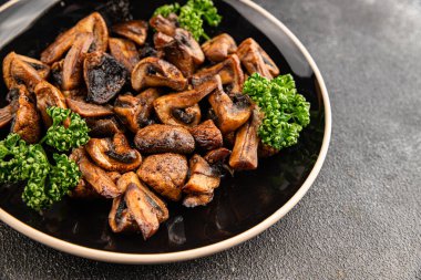 Mantar kızartması şampiyonu sebze yemeği taze gurme yemek masanın üzerinde rustik yemek üst görünüm fotokopi alanı vejetaryen ve vejetaryen yemekleri