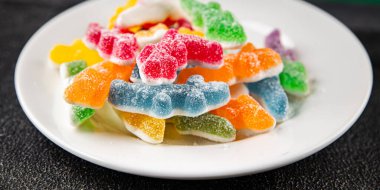 Jöleli şeker, tatlı, lezzetli gurme yemek arka planı, masa rustik yemekler, fotokopi alanı vejetaryen ve vejetaryen yemekleri.