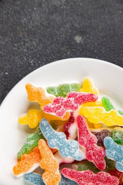 Jöleli şeker, tatlı, lezzetli gurme yemek arka planı, masa rustik yemekler, fotokopi alanı vejetaryen ve vejetaryen yemekleri.