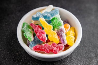 Jöleli şeker, tatlı, lezzetli gurme yemek arka planı, masa rustik yemekler, fotokopi alanı vejetaryen ve vejetaryen yemekleri.