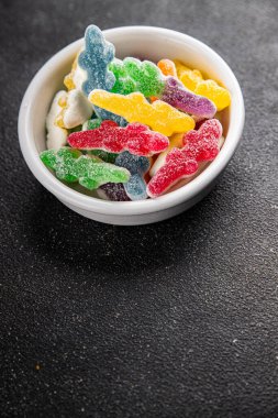 Jöleli şeker, tatlı, lezzetli gurme yemek arka planı, masa rustik yemekler, fotokopi alanı vejetaryen ve vejetaryen yemekleri.