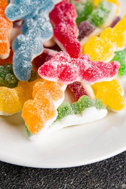 Jöleli şeker, tatlı, lezzetli gurme yemek arka planı, masa rustik yemekler, fotokopi alanı vejetaryen ve vejetaryen yemekleri.