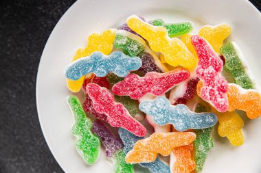 Jöleli şeker, tatlı, lezzetli gurme yemek arka planı, masa rustik yemekler, fotokopi alanı vejetaryen ve vejetaryen yemekleri.