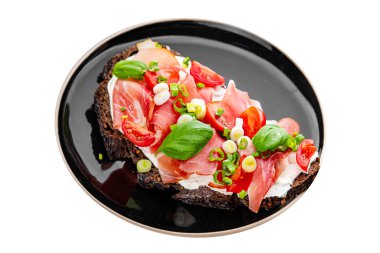 Jambon, domates, yeşillik taze lezzetli gurme yemek arkaplanı masa kırsal yiyeceklerin üst görünümü fotokopi alanı.