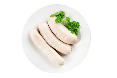 Sosis beyaz et tabağı taze sucuk sosisi taze lezzetli gurme yemek arkaplanı masa kırsal yiyeceklerin üst görüntüsü fotokopi alanı