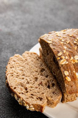 Yulaf ekmeği kepekli, kepekli, kepekli, kepekli, doğal, lezzetli, lezzetli gurme yemek arkaplanı masa kırsal gıdanın üstünde fotokopi alanı.