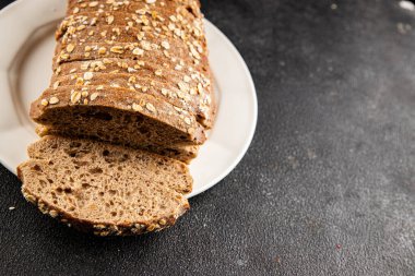 Yulaf ekmeği kepekli, kepekli, kepekli, kepekli, doğal, lezzetli, lezzetli gurme yemek arkaplanı masa kırsal gıdanın üstünde fotokopi alanı.