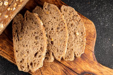 Yulaf ekmeği kepekli, kepekli, kepekli, kepekli, doğal, lezzetli, lezzetli gurme yemek arkaplanı masa kırsal gıdanın üstünde fotokopi alanı.