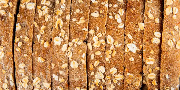 Yulaf ekmeği kepekli, kepekli, kepekli, kepekli, doğal, lezzetli, lezzetli gurme yemek arkaplanı masa kırsal gıdanın üstünde fotokopi alanı.