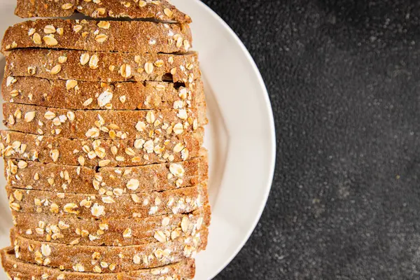 Yulaf ekmeği kepekli, kepekli, kepekli, kepekli, doğal, lezzetli, lezzetli gurme yemek arkaplanı masa kırsal gıdanın üstünde fotokopi alanı.