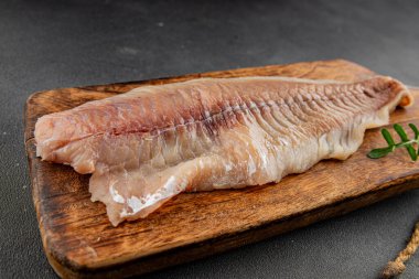 Çiğ fileto beyaz balık doğal besin taze pesseeter diyet gurme arka plan masa üzerinde rustik gıda üst görünüm fotokopi uzay keto ve paleo