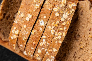 Yulaf ekmeği kepekli, kepekli, kepekli, kepekli, doğal, lezzetli, lezzetli gurme yemek arkaplanı masa kırsal gıdanın üstünde fotokopi alanı.