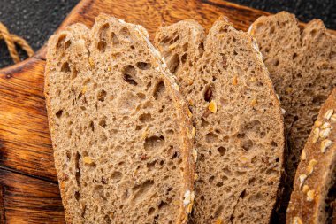 Yulaf ekmeği kepekli, kepekli, kepekli, kepekli, doğal, lezzetli, lezzetli gurme yemek arkaplanı masa kırsal gıdanın üstünde fotokopi alanı.