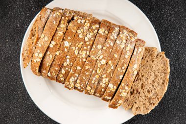 Yulaf ekmeği kepekli, kepekli, kepekli, kepekli, doğal, lezzetli, lezzetli gurme yemek arkaplanı masa kırsal gıdanın üstünde fotokopi alanı.