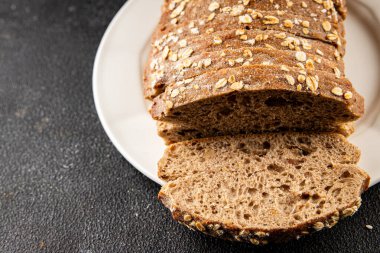 Yulaf ekmeği kepekli, kepekli, kepekli, kepekli, doğal, lezzetli, lezzetli gurme yemek arkaplanı masa kırsal gıdanın üstünde fotokopi alanı.