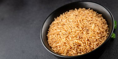 Kahverengi pirinç, tahıl, tahıl, sağlıklı yiyecek, süper yemek, lezzetli gurme, yemek, masa üstü yemek, fotokopi, uzay keto, paleo diyet vejetaryen ve vejetaryen yemekleri.