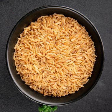 Kahverengi pirinç, tahıl, tahıl, sağlıklı yiyecek, süper yemek, lezzetli gurme, yemek, masa üstü yemek, fotokopi, uzay keto, paleo diyet vejetaryen ve vejetaryen yemekleri.