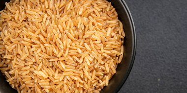 Kahverengi pirinç, tahıl, tahıl, sağlıklı yiyecek, süper yemek, lezzetli gurme, yemek, masa üstü yemek, fotokopi, uzay keto, paleo diyet vejetaryen ve vejetaryen yemekleri.
