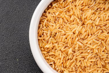 Kahverengi pirinç, tahıl, tahıl, sağlıklı yiyecek, süper yemek, lezzetli gurme, yemek, masa üstü yemek, fotokopi, uzay keto, paleo diyet vejetaryen ve vejetaryen yemekleri.