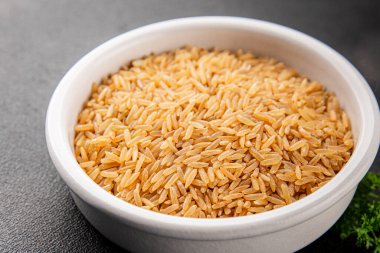 Kahverengi pirinç, tahıl, tahıl, sağlıklı yiyecek, süper yemek, lezzetli gurme, yemek, masa üstü yemek, fotokopi, uzay keto, paleo diyet vejetaryen ve vejetaryen yemekleri.