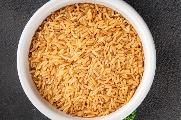 Kahverengi pirinç, tahıl, tahıl, sağlıklı yiyecek, süper yemek, lezzetli gurme, yemek, masa üstü yemek, fotokopi, uzay keto, paleo diyet vejetaryen ve vejetaryen yemekleri.