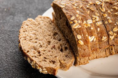 Yulaf ekmeği kepekli, kepekli, kepekli, kepekli, doğal, lezzetli, lezzetli gurme yemek arkaplanı masa kırsal gıdanın üstünde fotokopi alanı.