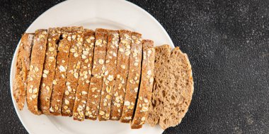 Yulaf ekmeği kepekli, kepekli, kepekli, kepekli, doğal, lezzetli, lezzetli gurme yemek arkaplanı masa kırsal gıdanın üstünde fotokopi alanı.