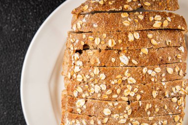 Yulaf ekmeği kepekli, kepekli, kepekli, kepekli, doğal, lezzetli, lezzetli gurme yemek arkaplanı masa kırsal gıdanın üstünde fotokopi alanı.