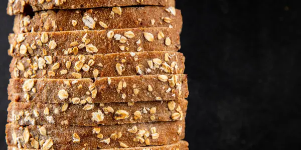 Yulaf ekmeği kepekli, kepekli, kepekli, kepekli, doğal, lezzetli, lezzetli gurme yemek arkaplanı masa kırsal gıdanın üstünde fotokopi alanı.