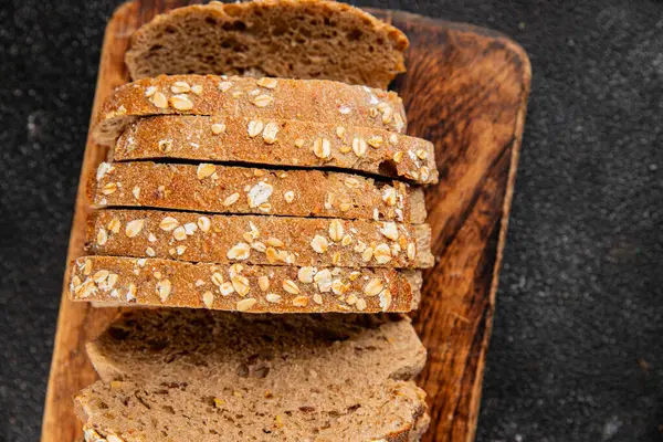 Yulaf ekmeği kepekli, kepekli, kepekli, kepekli, doğal, lezzetli, lezzetli gurme yemek arkaplanı masa kırsal gıdanın üstünde fotokopi alanı.