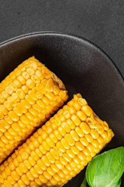 Mısır koçanı yiyeceği, abur cubur, sebze, lezzetli gurme yemek arkaplanı, kırsal yiyecekler, fotokopi alanı.