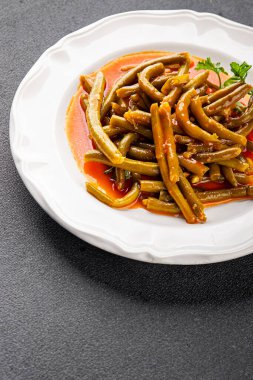 Yeşil fasulye sosu taze lezzetli gurme yemek arkaplanı masaya rustik yemek üst görünüm uzay keto ve paleo diyet vejetaryen ve vejetaryen gıda