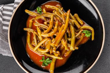 Yeşil fasulye sosu taze lezzetli gurme yemek arkaplanı masaya rustik yemek üst görünüm uzay keto ve paleo diyet vejetaryen ve vejetaryen gıda