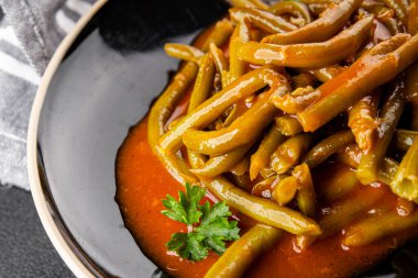 Yeşil fasulye sosu taze lezzetli gurme yemek arkaplanı masaya rustik yemek üst görünüm uzay keto ve paleo diyet vejetaryen ve vejetaryen gıda