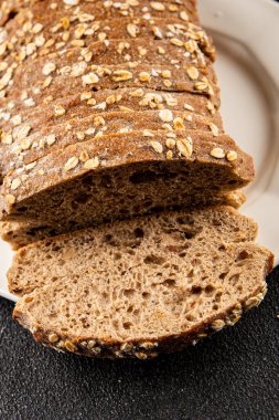 Yulaf ekmeği, kepekli çörek, yulaf ezmesi, hamur işi, doğal yemek, gurme yemek arka planı, kırsal yiyecekler, fotokopi alanı.