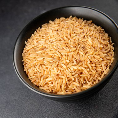 Kahverengi pirinç gevreği tam tahıl sağlıklı ürünler süper yiyecekler taze yemek arkaplanı masa kırsal yiyeceklerin üst görünümü fotokopi alanı