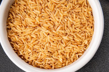 Kahverengi pirinç, tahıl, tahıl, sağlıklı yiyecek, süper yemek, lezzetli gurme, yemek, masa üstü yemek, fotokopi, uzay keto, paleo diyet vejetaryen ve vejetaryen yemekleri.