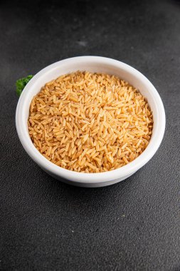 Kahverengi pirinç, tahıl, tahıl, sağlıklı yiyecek, süper yemek, lezzetli gurme, yemek, masa üstü yemek, fotokopi, uzay keto, paleo diyet vejetaryen ve vejetaryen yemekleri.