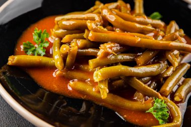 Yeşil fasulye sosu taze lezzetli gurme yemek arkaplanı masaya rustik yemek üst görünüm uzay keto ve paleo diyet vejetaryen ve vejetaryen gıda