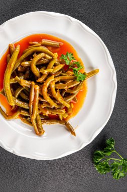 Yeşil fasulye sosu taze lezzetli gurme yemek arkaplanı masaya rustik yemek üst görünüm uzay keto ve paleo diyet vejetaryen ve vejetaryen gıda