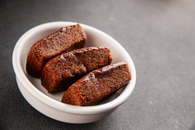 Biscuit Financier çikolatalı kurabiye tatlı tatlı lezzetli gurme yemek arkaplanı masa rustik gıda üst görünüm fotokopi alanı