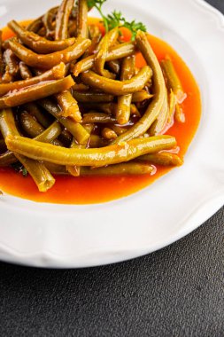 Yeşil fasulye sosu taze gurme yemek arka planı üzerinde rustik üst görünüm fotokopi uzay keto ve paleo diyet vejetaryen ve vejetaryen gıda