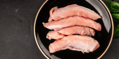 Tavşan çiğ et fileto taze lezzetli gurme yemek arka planı masa rustik gıda üst görünüm fotokopi alanı keto ve paleo diyet