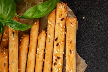 Grissotti ekmek çubuğu Grissini tahıl gevreği tahıl gevreği taze lezzetli gurme yemek arkaplanı masa rustik gıda üst görünümü fotokopi alanı